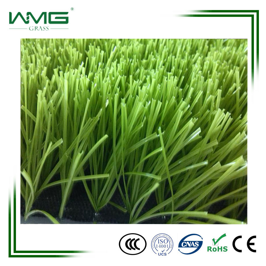 Professional laying artificial turf for football field